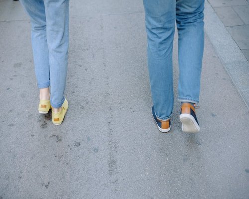 Comfortable walking shoes on a city pavement